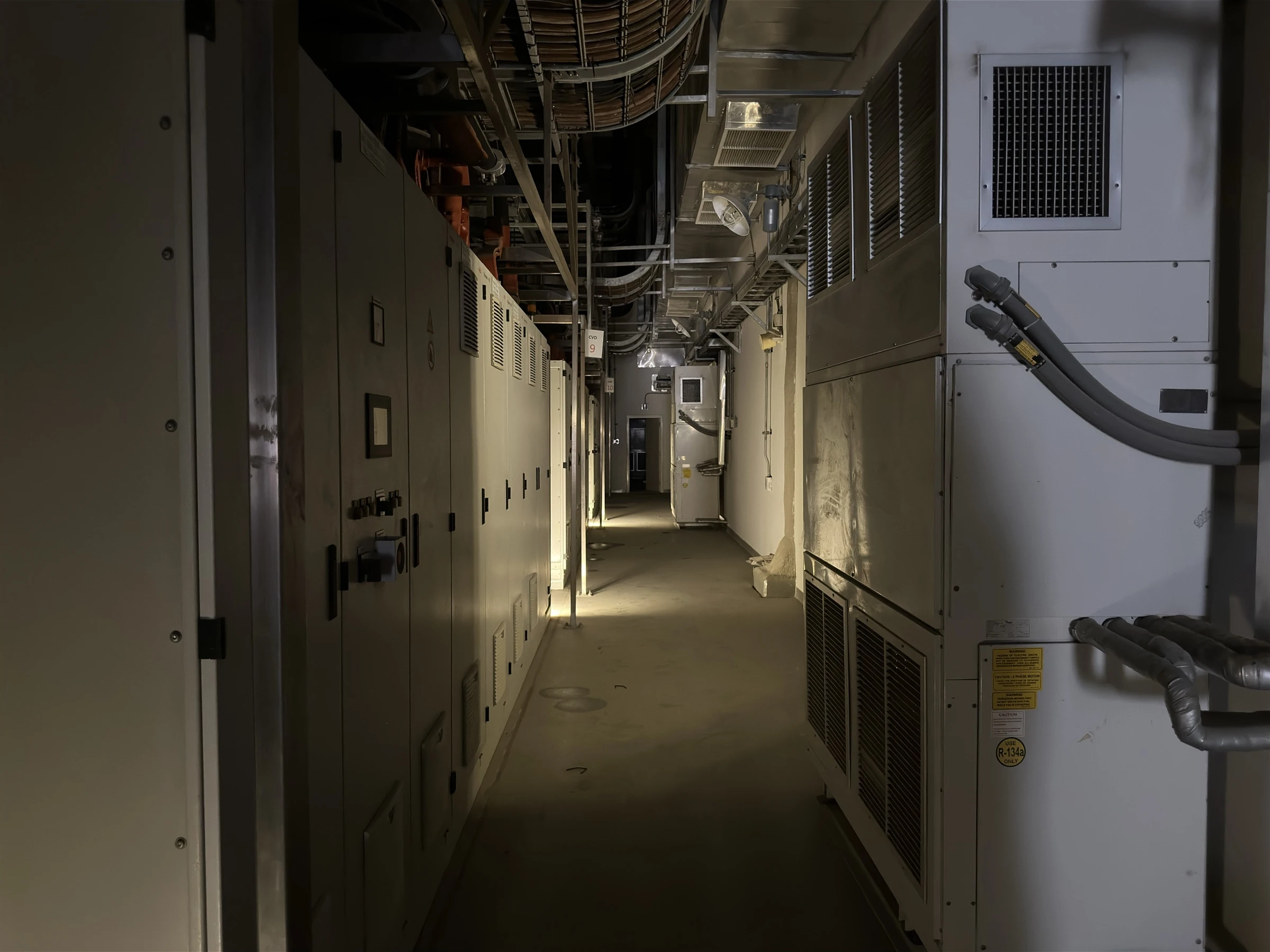 Factory equipment corridor and electrical cabinets