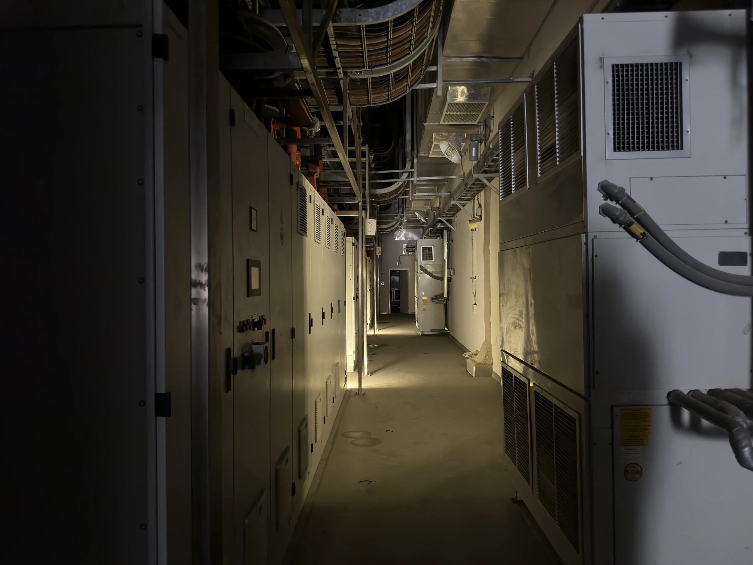 Factory equipment corridor and electrical cabinets